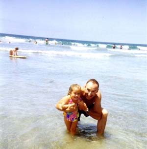 Stu and Caitlin in the ocean at Coronado Beach (Personal album)