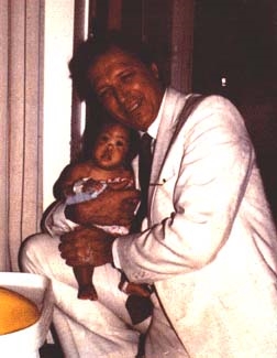 Dr. Kopits and one of his young patients<br> (http://www.hispraise.com/joanna/joanna.htm  )