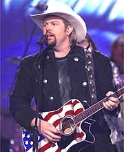<a href=http://images.usatoday.com/life/_photos/2002/2002-06-13-inside-toby-keith.jpg>Toby Keith</a>
