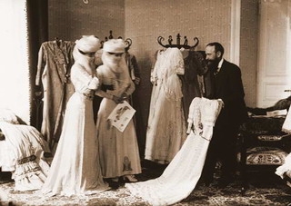 A french designer shows off his creations to two high-society Egyptian women <a href=http://www.egyptedantan.com/vie_quotidienne/vie_quotidienne6.htm>circa 1909.</a>