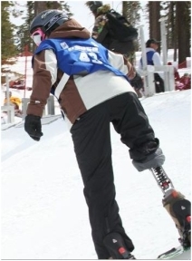 An adaptive athlete snowboarding (www.adaptiveactionsports.com)