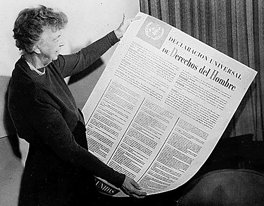 Eleanor Roosevelt holding up the Human Rights doc (http://www.thenutgraph.com/user_uploads/images/2008/12/09/TOP_HR_LandEleanorRooseveltWikipedia.jpg)