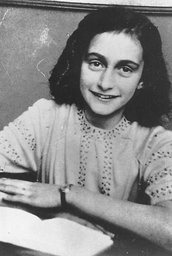 Anne smiling happily  (http://www.holocaustresearchproject.org/nazioccupation/annefrank.html)