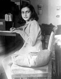 Anne doing what she loves writing (http://www.holocaustresearchproject.org/nazioccupation/annefrank.html)