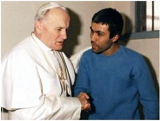 Pope John Paul II forgives his attempted killer. (http://resources2.news.com.au/)