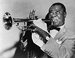 Louis Armstrong playing the Trumpet (Google Images)