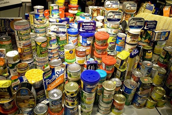 Cans stacked up at a food drive in New York City. Operation Just One Can has a simple theme: Donate 
