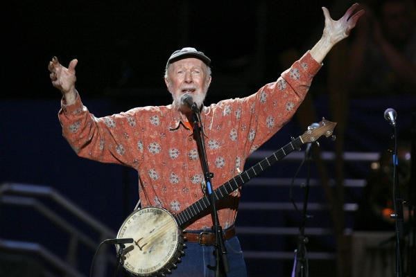 Pete Seeger performing with a banjo
