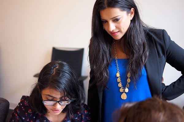 Reshma Saujani (r.) and a Girls Who Code participant visit AppNexus, an online advertising company based in New York City.