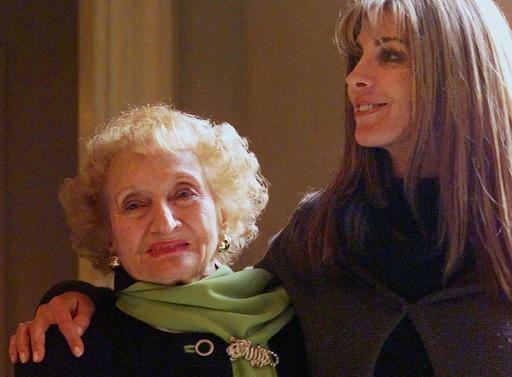 In this Jan. 9, 2001, file photo, Dr. Ruth Gruber, left, and actress Natasha Richardson pose for a photo at the Ritz Carlton Huntington Hotel in Pasadena, Calif. Gruber, the journalist and humanitarian whose long, trailblazing life included helping to bring Jewish refugees to the United States during World War II, has died. She was 105. Gruber died on Thursday, Nov. 17, 2016, at her home in Manhattan, according to her editor, Philip Turner. (AP Photo/Damian Dovarganes, File)