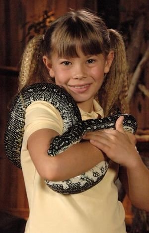 Bindi Irwin holding a snake
