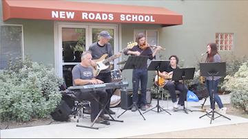 MY HERO Music Director Stuart Perlman performs with New Roads musicians