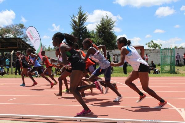 Angelina Nadai of South Sudan (center, in light blue top) competes in a 1500 meter race at a recent meet in Eldoret, Kenya, where her competitors were among the country's most elite middle distance runners.