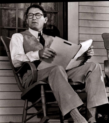 Atticus Finch played by actor Gregory Peck (http://www.empireonline.com/images/features/100greatestcharacters/photos/70.jpg)