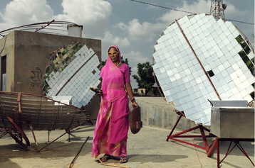 Solar-Engineer with parabolic solar cookers (http://www.wired.co.uk/magazine/archive/2011/04/features/disrupting-poverty?page=all ())