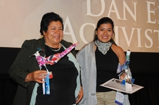 Erica Fernandez and her mom pose with their bird trophies at the 2011 MY HERO International Film Festival