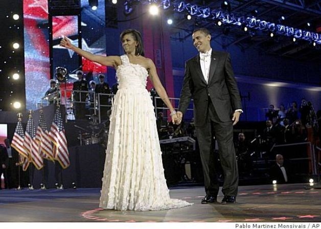 The 44th president and first lady  (http://www.sfgate.com/news/article/Michelle-Obama-surprises-with-designer-choices-3175654.php#photo-2031913 ())