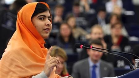 Malala giving a speech (http://www.thenewstribe.com/2012/10/15/shot-pakist (CTV News Staff))