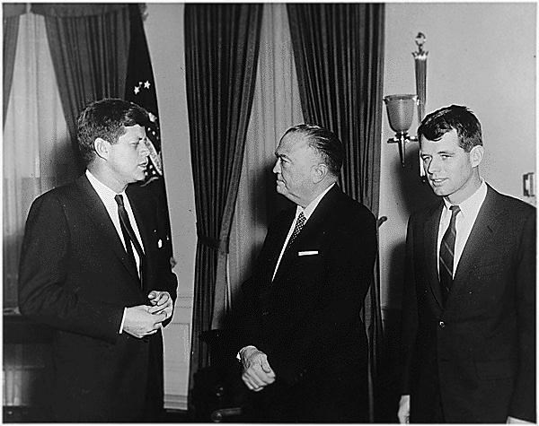 Visit of Attorney General and Director of FBI. President Kennedy, J.Edgar Hoover, Robert F. Kennedy. White House, Oval Office. 2/23/1961<br>Photo courtesy of John F. Kennedy Library and Museum
