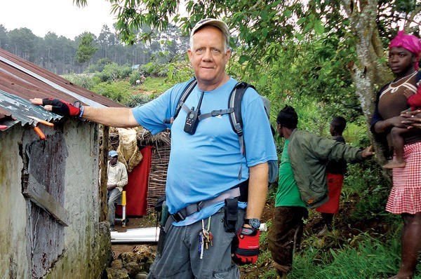 Bob Keesee combines simple materials such as PVC pipes, tubing, and brackets to build rain-catching systems that provide clean water to thousands of people living in Haiti. <P>Judith Ritter