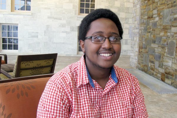 Middlebury College junior Armel Nibasumba founded a camp in his native country of Burundi designed to break down ethnic barriers between Hutus and Tutsis. <P>Wilson Ring/AP