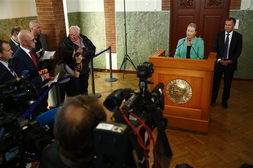 Kaci Kullmann Five, chairman of the Nobel Peace Prize award committee, announces the laureate of Nobel Peace Prize 2016, Colombian President Juan Manuel Santos, during a ceremony in Oslo, Norway, Friday Oct. 7, 2016. Colombian President Juan Manuel Santos won the Nobel Peace Prize for his efforts to end a civil war that killed more than 200,000 Colombians. (Heiko Junge NTB scanpix via AP)