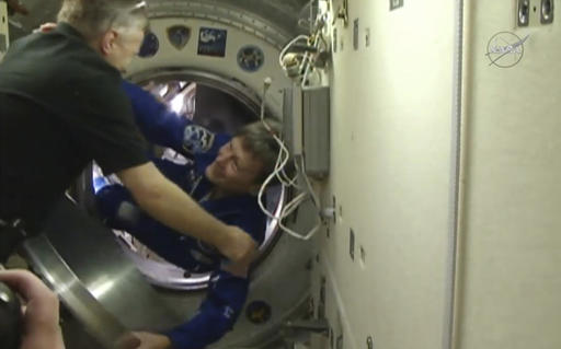 In this image made from video provided by NASA, astronaut Peggy Whitson boards the International Space Station on Saturday, Nov. 19, 2016. This is the third space station mission for Whitson, who at 56 is older than each of her crewmates. (NASA via AP)