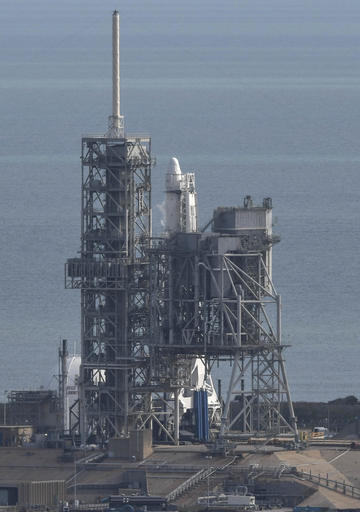 A SpaceX Falcon 9 rocket remains on launch Pad 39A at Kennedy Space Center, Fla., Saturday, Feb. 18, 2017. The rocket, scheduled to lift off with cargo for the International Space Station, was aborted with 13 seconds to go in the countdown. ( Craig Bailey/Florida Today via AP)