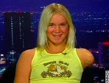  (http://www.cnn.com/2004/US/West/01/25/surfer.girl.ap/)