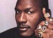 Michael Jordan  and his championship rings (I got this picture from google / images .com)