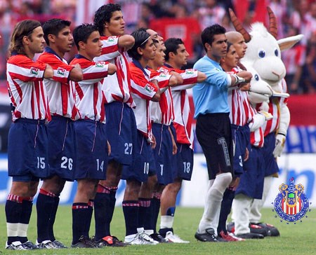 They have there hands in there chest (http://www.chivasdecorazon.com.mx/nueva/galeria.php)