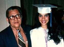 Rodriguez at her high school graduation with her father.