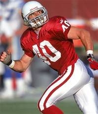 Pat Tillman playing for the Arizona Cardinals (http://pcfootball.net/images/Pat%20Tillman.jpg)