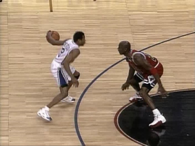 Allen Iverson crossing up Michael Jordan (http://img455.imageshack.us/img455/1609/aicrossmj8kh.jpg)