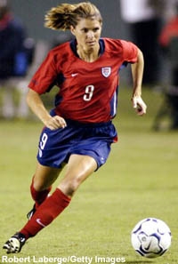 mia hamm with the ball