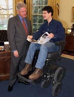 President Bill Clinton and Dean Kamen on his iBOT mobility system in the White House.