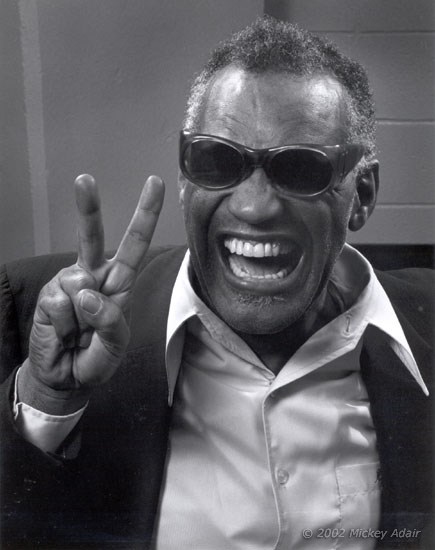 <a href=http://www.availablelightphoto.com/portraits/1981-RayCharles.jpg>Ray Charles and his love for life</a>