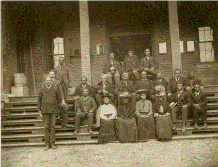 <a href=http://www.dollsgen.com/1900tuskegeenormal.htm>George (standing, upper left) at Tuskegee Institute</a>