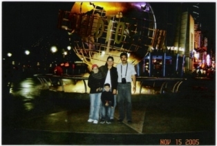 my father, my mom, my brother Carlos and  I (My father gave this picture to me)