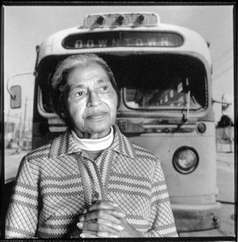Rosa Parks standing infront of the bus (www.dekalb.k12.ga.us)