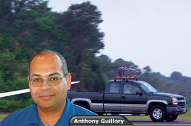 Guillory shown with an aerosonde loaded on top of a truck. Photo courtesy of <a href=http://www.jason.org>The JASON Project</a>