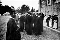 <a href=http://www.america.gov/st/washfile-english/2007/August/20070828162229berehellek0.5834467.html>Ernest Green at Graduation</a>