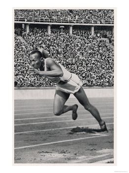 Jesse Owens lunges forward in the 200-meter dash