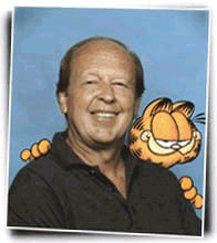 Jim Davis with Garfield in the background (http://members.tripod.com/~garfpaw/jimgar.gif)