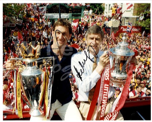 Wenger with Tony Adams lifted the trophies (www.google.com)