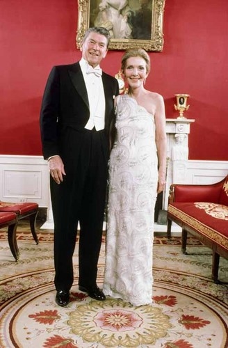 Mr. and Mrs. Ronald Reagan in the red room in the (http://marriage.about.com/od/presidentialmarriages/ig/Ronald-and-Nancy-Reagan-Photos/Reagans-Before-Inaugural-Balls.htm)