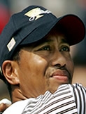 Tiger woods looking at the ball (http://www.biography.com/search/article.do?id=9536492)
