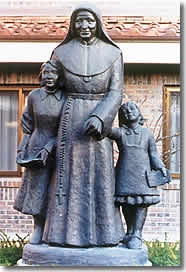 Statue of St. Julie Billiart with two children sh (http://www.snd1.org/Julie.html)