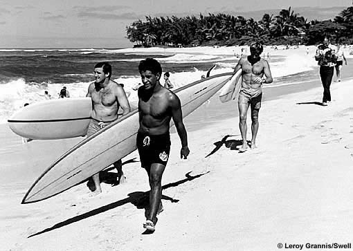This is Eddie Aikau walking with Greg Noll and Ge (www.surfline.com)