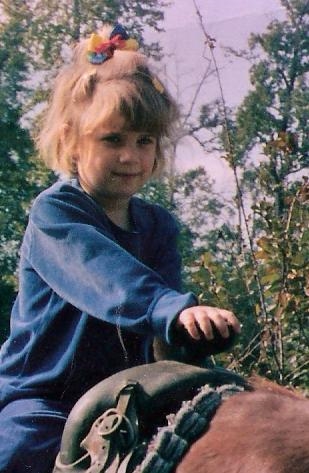 Kaye started riding at a young age (Family album)